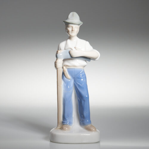 Figura de leñador de porcelana