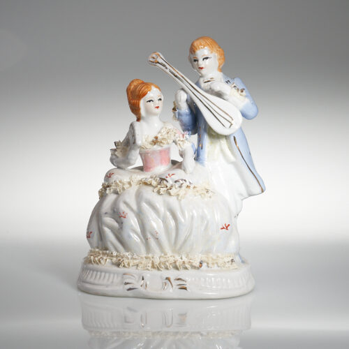 Figura de porcelana de dos músicos